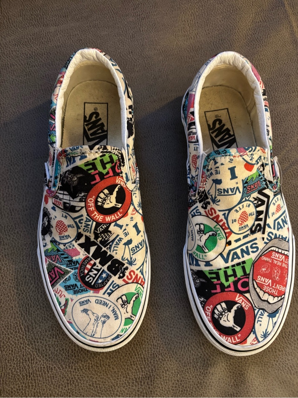 Vans Kids Slip-On Sneakers in White with Multicolor Sticker Print